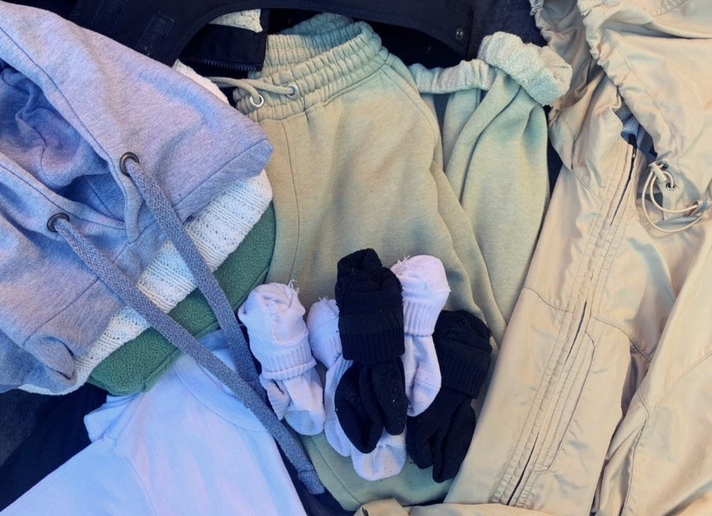 Image of warm clothing: joggers, hoodies, socks and coats.