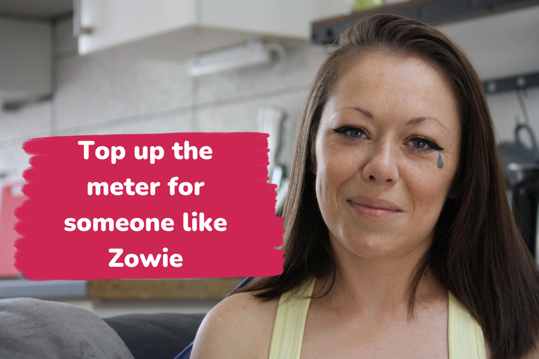 Woman smiling looking at camera with text "Top up the meter for someone like Zowie".